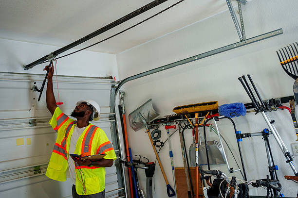 Professional Garage Door Panel Replacement technician working in Willimantic, CT